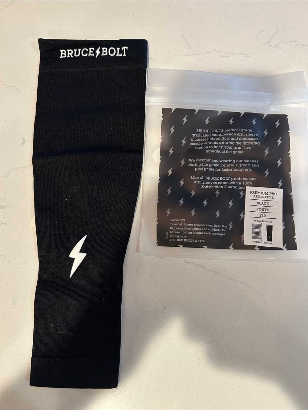 Bruce Bolt Black Youth Compression Arm Sleeve - Performance Support